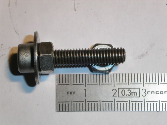 La vis de purge fabrique, il y a une erreur de parallaxe : elle fait bien 23 mm + un bout 